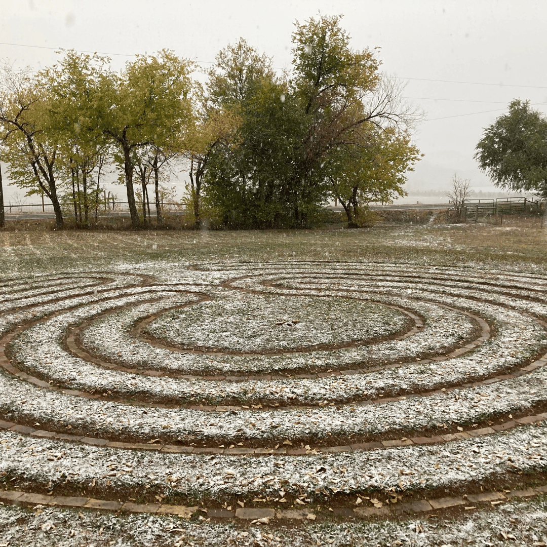 December Newsletter Images meditation labyrinth at sunrise ranch with a dusting of snow