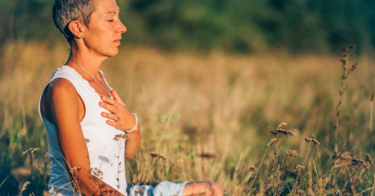 Nov 2023 – Email Newsletter – Blog Hero Images (2) woman meditating in a field